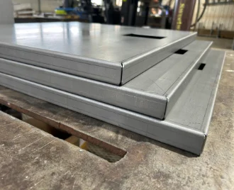 A sheet of metal that was cut with lasers