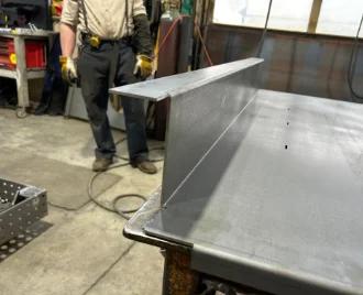 A sheet of metal that was cut with lasers