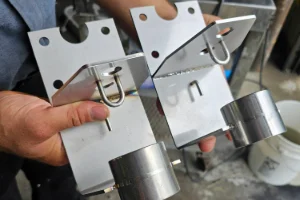 A pile of small metal pieces that were welded